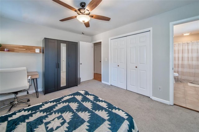 carpeted bedroom featuring ceiling fan and connected bathroom