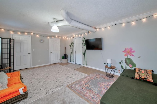 bedroom with ornamental molding and a textured ceiling