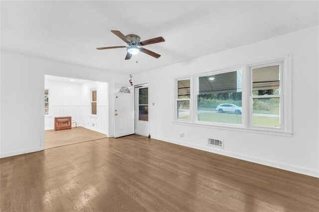 interior space with hardwood / wood-style flooring and ceiling fan