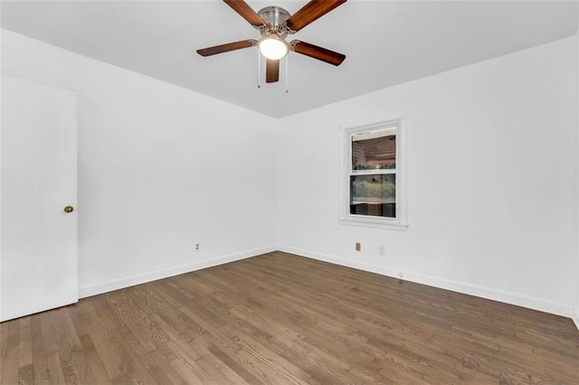 unfurnished room featuring hardwood / wood-style floors and ceiling fan