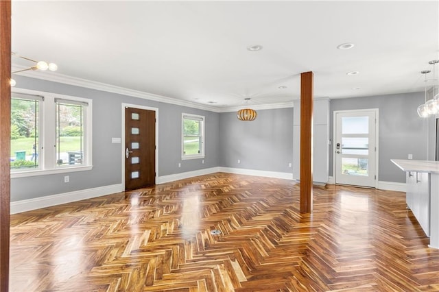 unfurnished living room featuring recessed lighting, baseboards, and ornamental molding