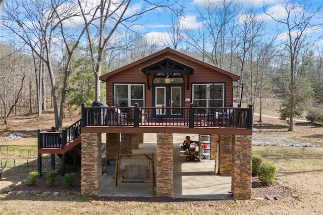 view of front of house with a deck