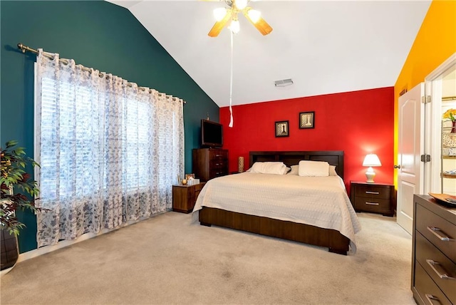 bedroom featuring light carpet, ceiling fan, and lofted ceiling