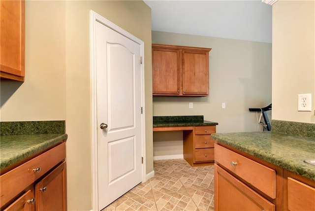 kitchen featuring built in desk