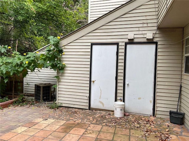 view of outdoor structure with central AC unit
