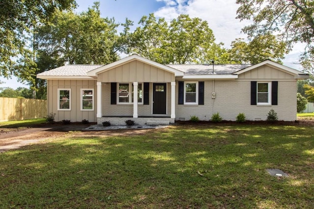 single story home with a front lawn