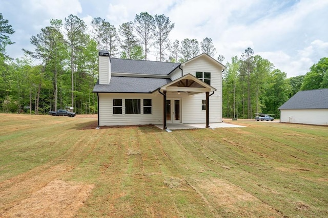 130 Doris Path, Dallas, GA 30157 - rear view of property featuring french doors, a yard, a chimney, and roof with shingles