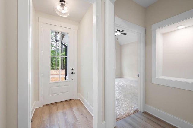 130 Doris Path, Dallas, GA 30157 - doorway to outside featuring light wood-style flooring, baseboards, and ceiling fan