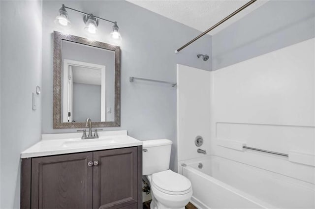 full bath with vanity, shower / bathtub combination, and toilet