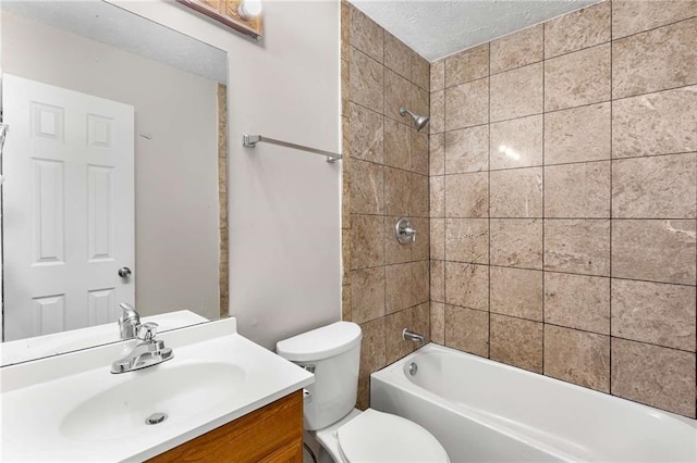2340 Beaver Ruin Rd Unit 68, Norcross, GA 30071 - full bathroom featuring vanity, toilet, shower / washtub combination, and a textured ceiling