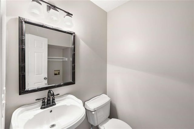 2340 Beaver Ruin Rd Unit 68, Norcross, GA 30071 - bathroom featuring a sink and toilet