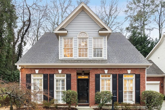 view of front of home featuring a garage and covered porch