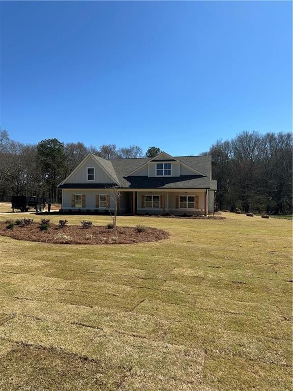 view of front of home with a front yard