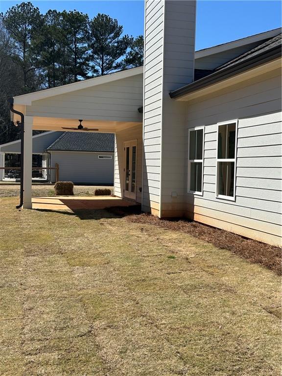 view of yard featuring french doors