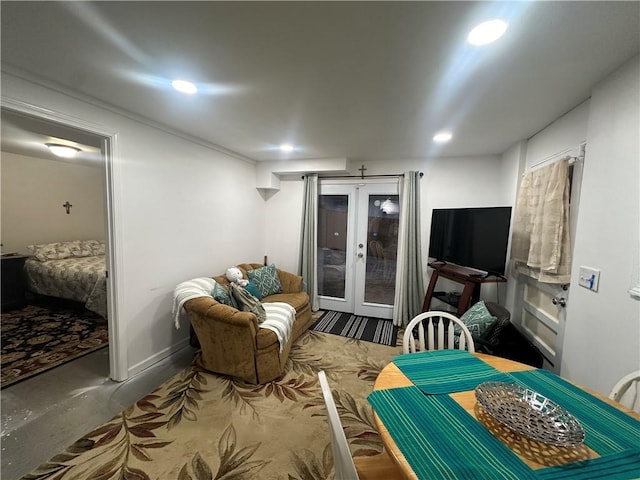 interior space with french doors and concrete flooring