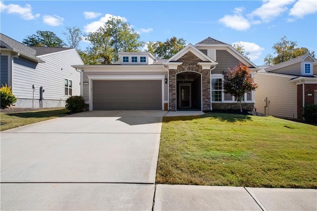 view of front of home featuring a garage and a front yard