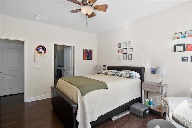 bedroom featuring dark hardwood / wood-style floors and ceiling fan