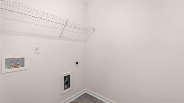 washroom with baseboards, hookup for an electric dryer, laundry area, and washer hookup