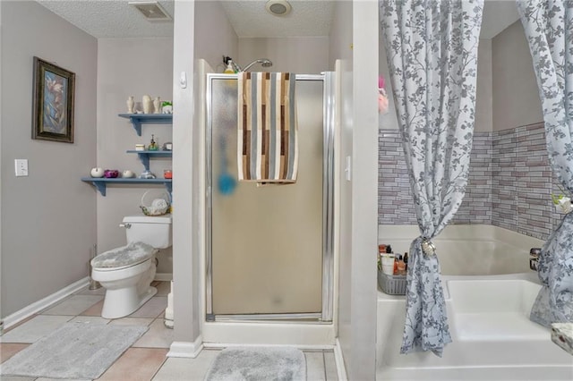 bathroom with a textured ceiling, toilet, plus walk in shower, and tile patterned flooring