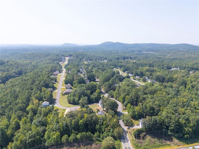 drone / aerial view featuring a mountain view