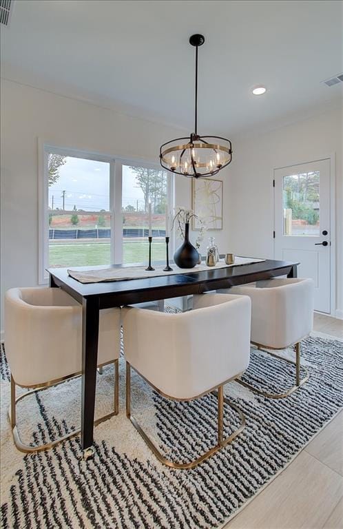 dining room featuring recessed lighting, visible vents, and a chandelier