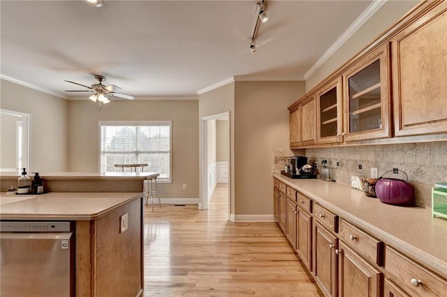 39 Legendary Dr, Hoschton, GA 30548 - kitchen featuring dishwasher, backsplash, light wood finished floors, a ceiling fan, and light countertops