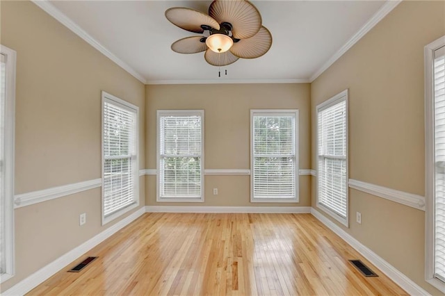39 Legendary Dr, Hoschton, GA 30548 - spare room with a ceiling fan, wood-type flooring, and ornamental molding