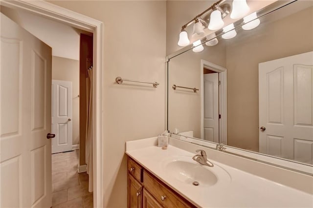 39 Legendary Dr, Hoschton, GA 30548 - bathroom featuring vanity, tile patterned floors, and curtained shower