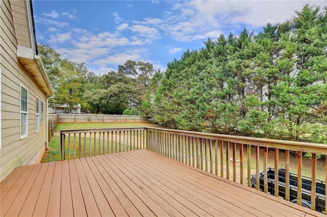 39 Legendary Dr, Hoschton, GA 30548 - deck featuring a fenced backyard and view of wooded area