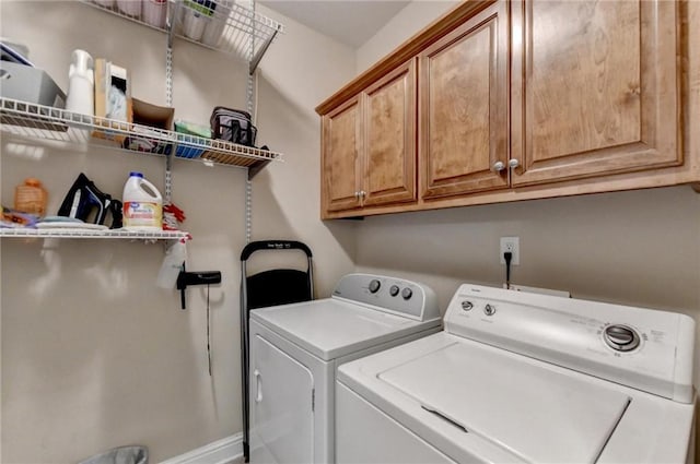 39 Legendary Dr, Hoschton, GA 30548 - laundry room with washer and dryer and cabinet space