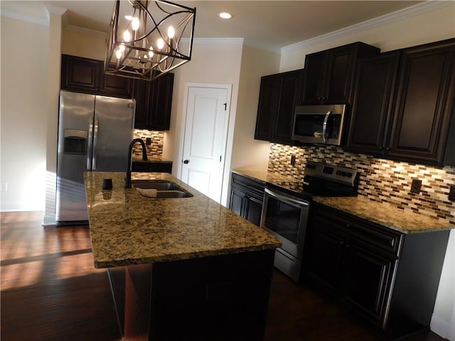 kitchen with stainless steel appliances, stone countertops, dark wood-type flooring, ornamental molding, and a sink