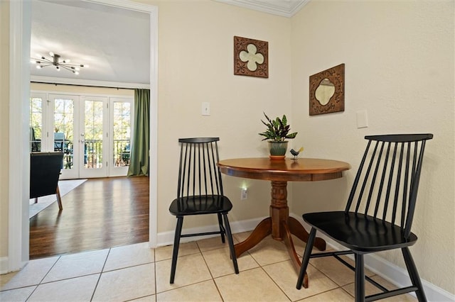 869 Briarcliff Rd NE Unit B20, Atlanta, GA 30306 - tiled dining room with crown molding, baseboards, and french doors