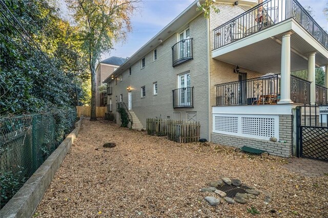 869 Briarcliff Rd NE Unit B20, Atlanta, GA 30306 - view of property exterior featuring a balcony and covered porch