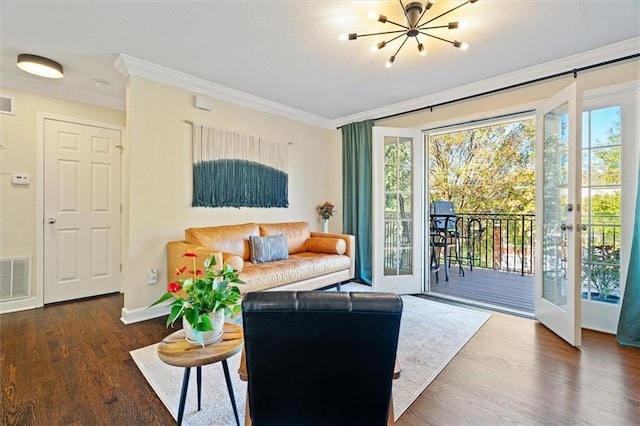 869 Briarcliff Rd NE Unit B20, Atlanta, GA 30306 - living area with crown molding, a chandelier, wood finished floors, french doors, and baseboards