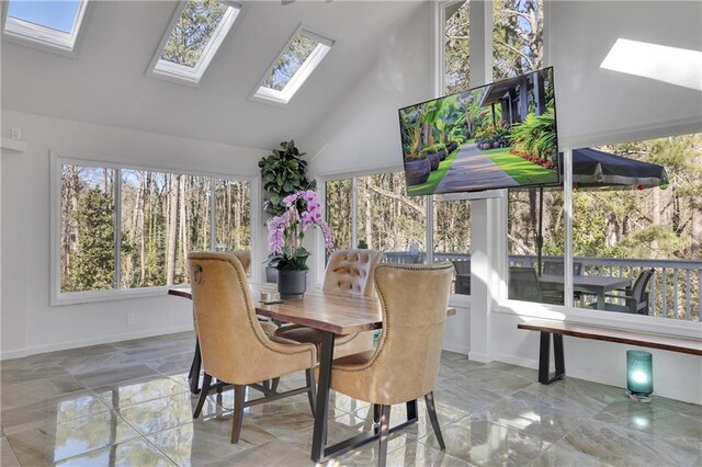 sunroom / solarium featuring lofted ceiling