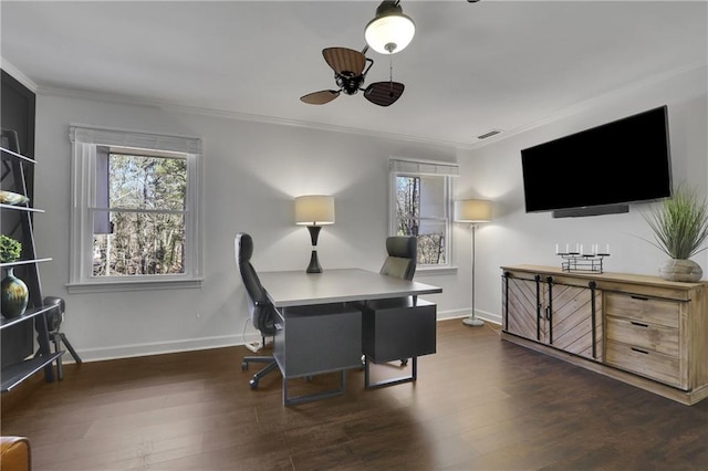 home office with ceiling fan, ornamental molding, and dark hardwood / wood-style flooring