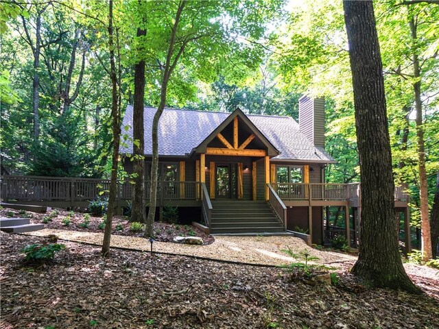 view of front facade featuring a wooden deck