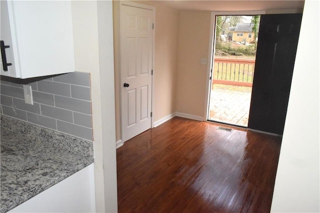 interior space featuring dark hardwood / wood-style flooring