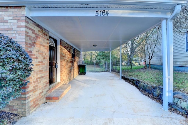 view of patio / terrace with a carport