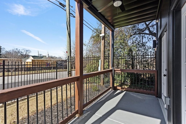 balcony featuring a ceiling fan