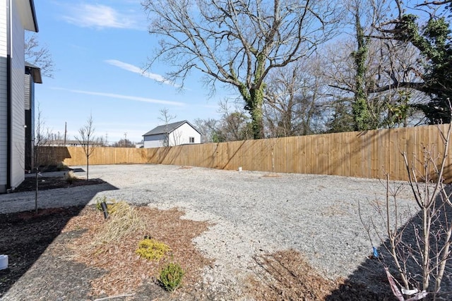 view of yard featuring a fenced backyard