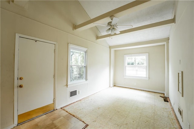 entrance foyer with lofted ceiling with beams and ceiling fan