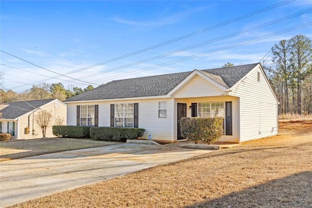 ranch-style home with a front lawn