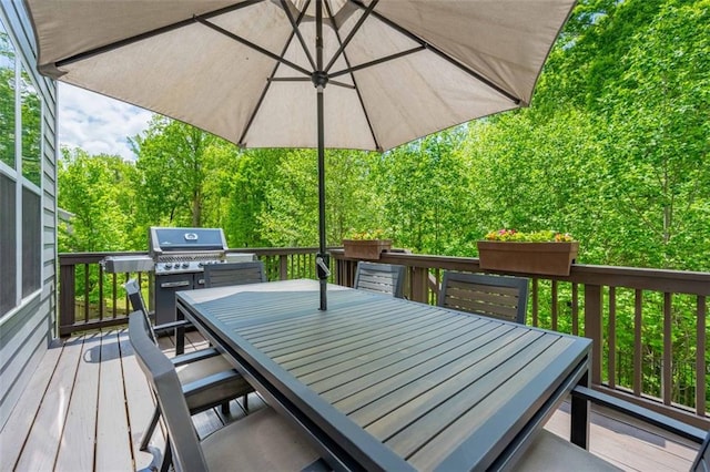 wooden deck featuring outdoor dining space
