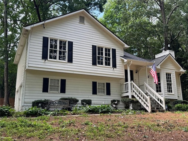 671 Peach Crossing Dr, Dallas, GA 30132 - split level home featuring a chimney
