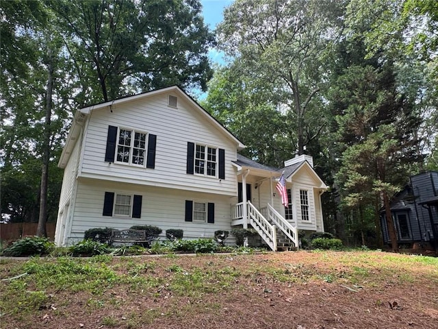 671 Peach Crossing Dr, Dallas, GA 30132 - split level home with a chimney