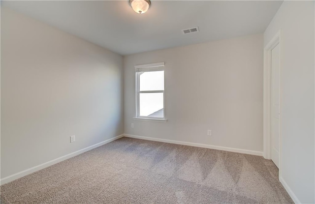 view of carpeted spare room