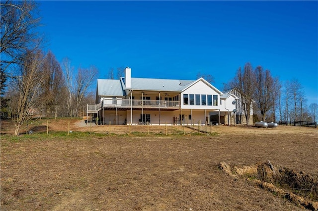 rear view of house with a deck