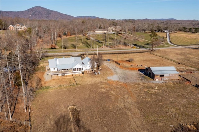 bird's eye view featuring a rural view and a mountain view