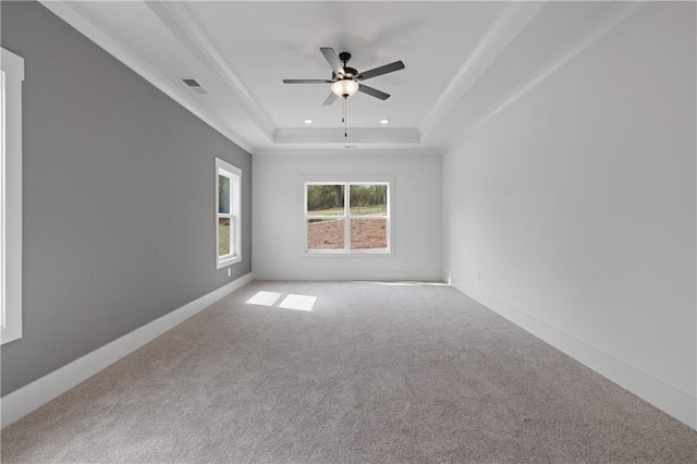 carpeted spare room with a ceiling fan, baseboards, visible vents, recessed lighting, and a raised ceiling